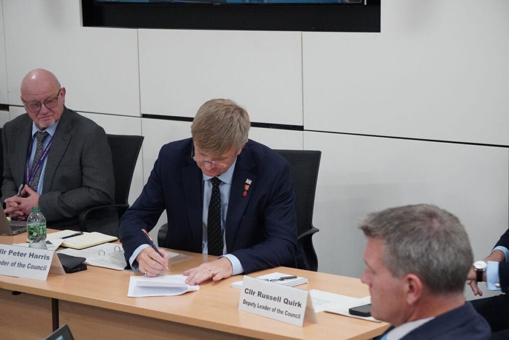 Councillor Peter Harris signing the Cabinet paper confirming Essex County Council’s consent to the Greater Essex Mayoral Strategic Authority